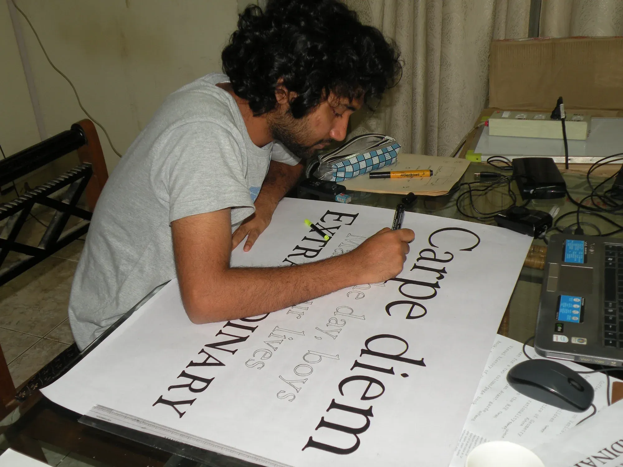 Hand-lettering a Carpe Diem poster on an A3 sheet