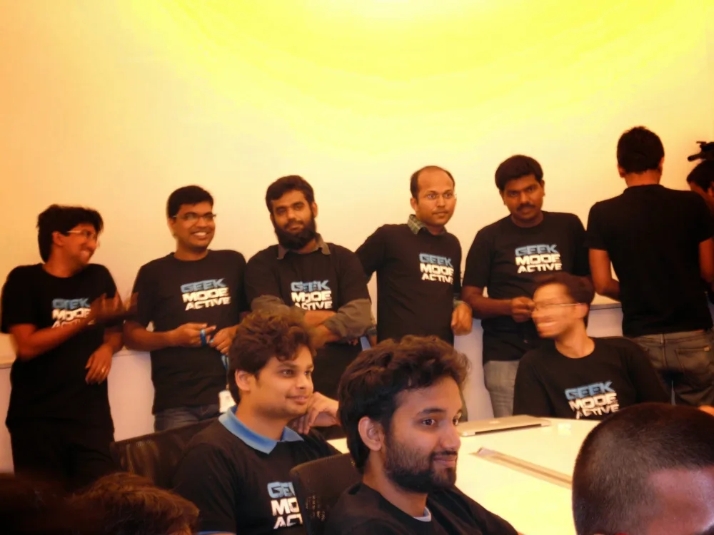 The Practo team wearing "Geek Mode Active" t-shirts at a hackathon